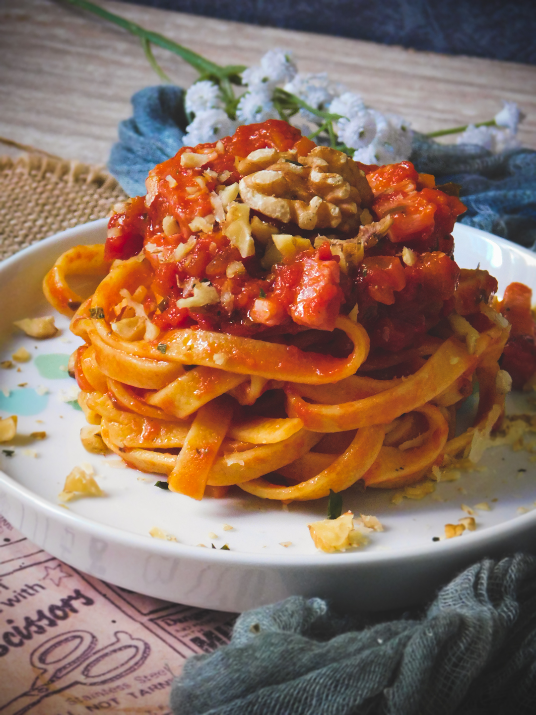 Tagliolini al tartufo aromatizzati con sugo di pancetta dolce e noci